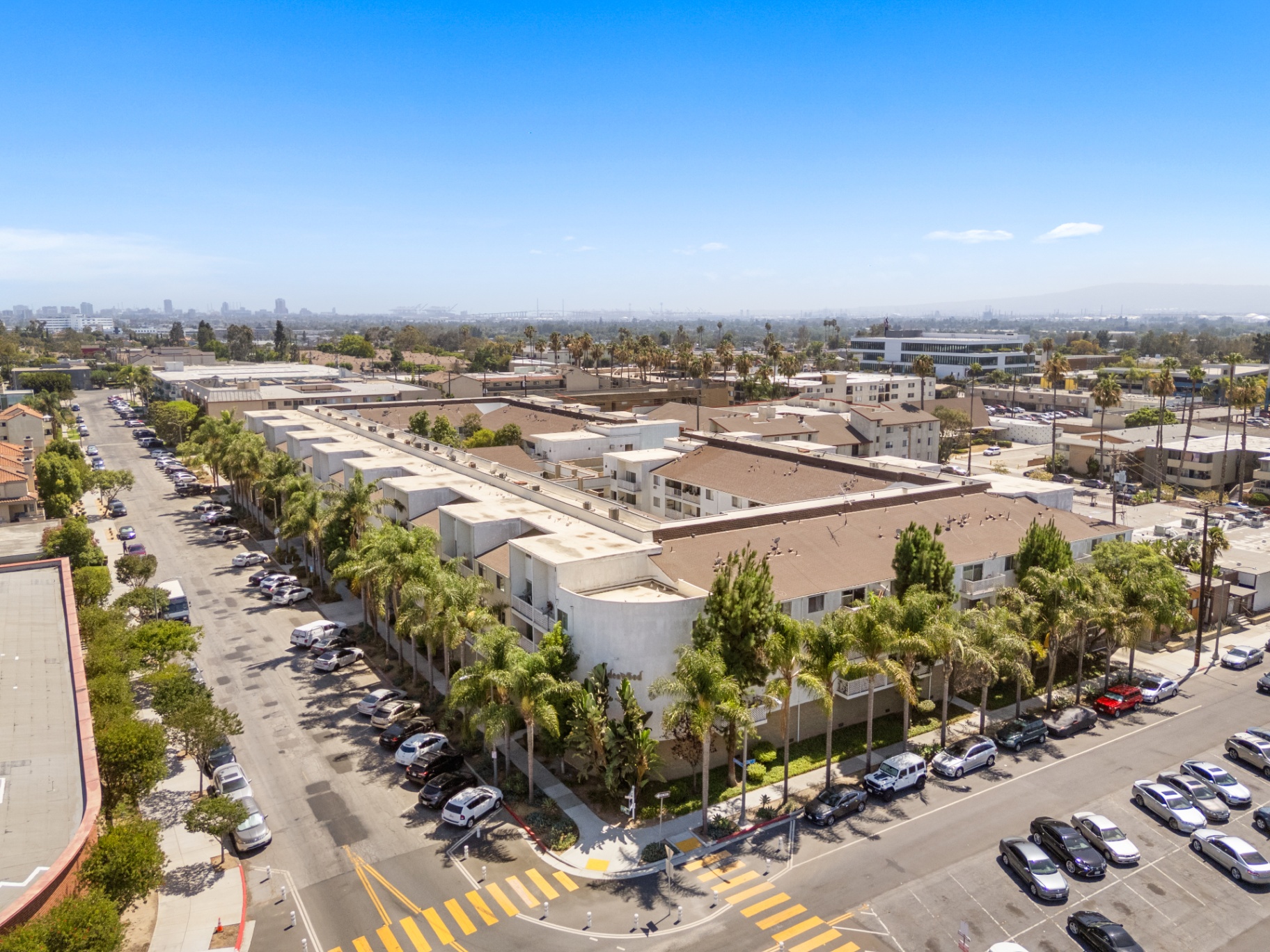 Aerial view over Bixby Knolls with downtown Long Beach skyline in the distance